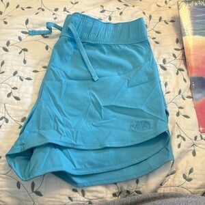 The north face women’s shorts, bright blue size medium